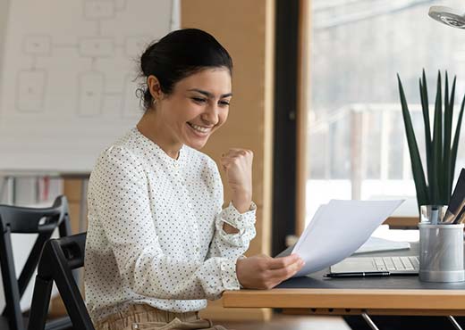 A lady excited about an application approval